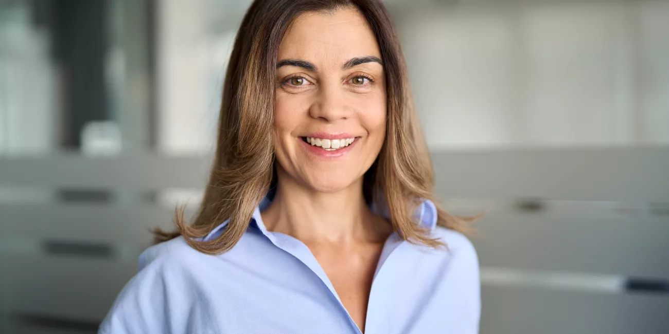 Woman in side profile, soft natural lighting, considering neck rejuvenation