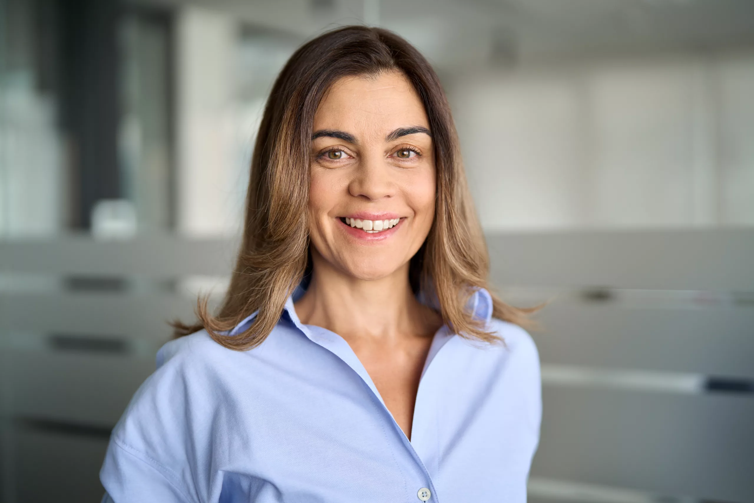 Woman in side profile, soft natural lighting, considering neck rejuvenation